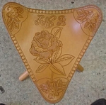 carved leather stool