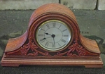 carved leather mantle clock